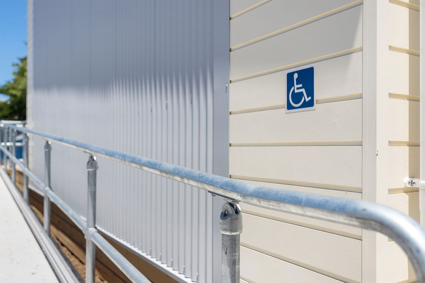 classrooms accessibility sign and Moddex hand rails